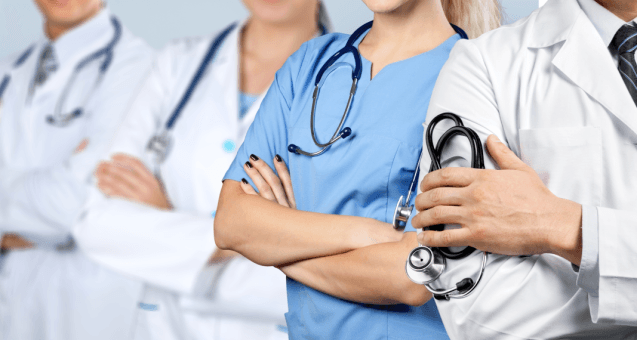 Medical team in scrubs and lab coats